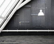 on the walls of an attic, raw material wallpaper representing an old grey store