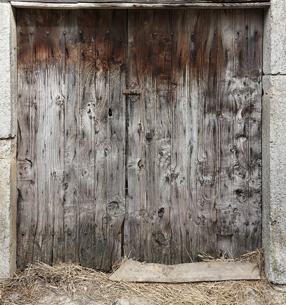 on the wall of a veranda, panoramic wallpaper raw material representing a barn door