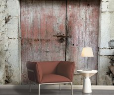 in a reading room, panoramic country wallpaper representing the door of a wine cellar