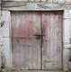 panoramic country wallpaper representing the door of a wine cellar