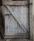 raw material wallpaper representing an old barn door