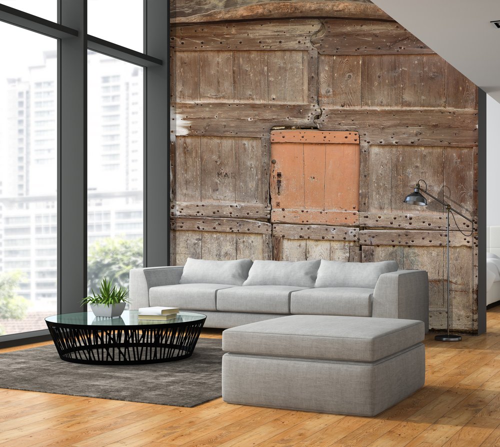 on a wall of a living room, panoramic country wallpaper representing an old barn door