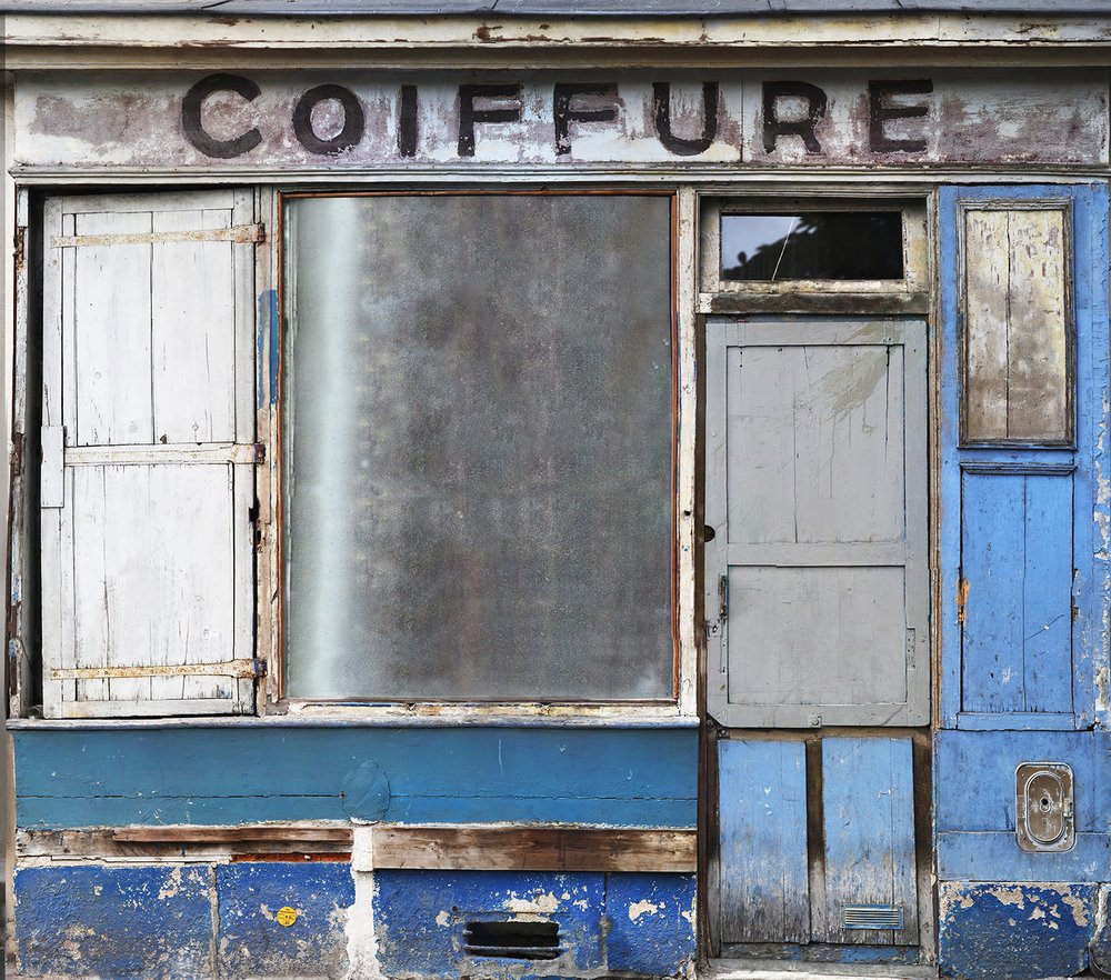 papier peint montrant une ancienne boutique de coiffeur