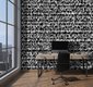 black and white patterned wallpaper in an office