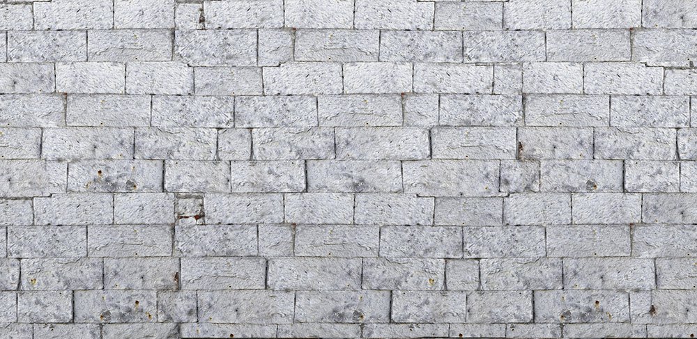 papier peint représentant un mur de pierres blanches