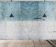 papier peint panoramique représentant un mur de béton bleu et des pierres blanches dans salle