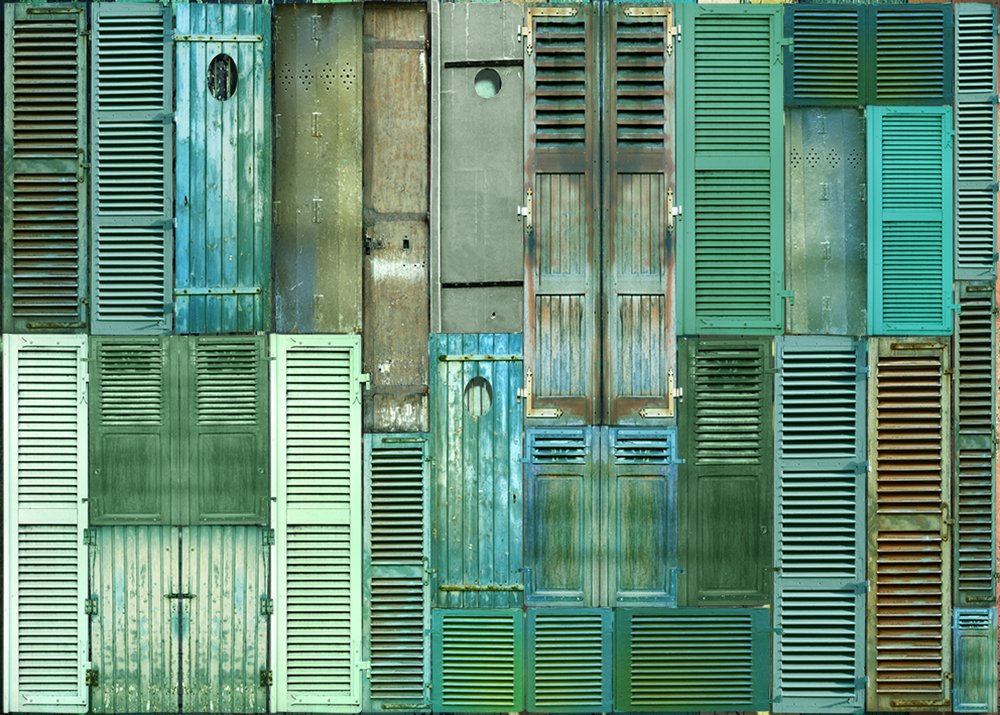 papier peint panoramique optimiste représentant un patchwork de volets verts