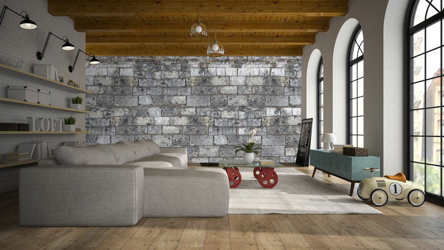 wallpaper showing a grey stone wall in a living room