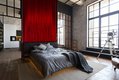 red striped wallpaper in a bedroom