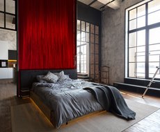 red striped wallpaper in a bedroom